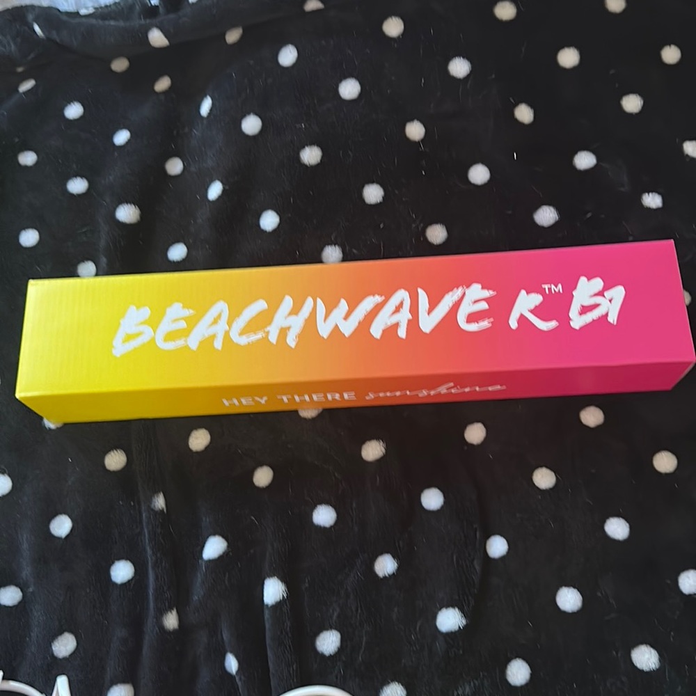 Beachwaver Co. Pink and neon yellow 1” curling iron.